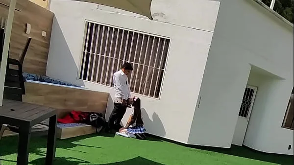 Young schoolboys have sex on the school terrace and are caught on a security camera.