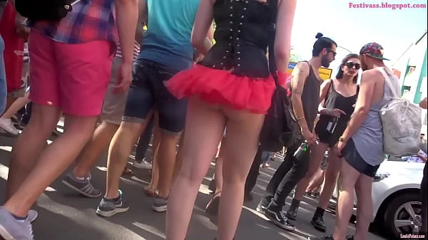 Festival Upskirt, frilly micro skirt with string panties. Great ass revealed!