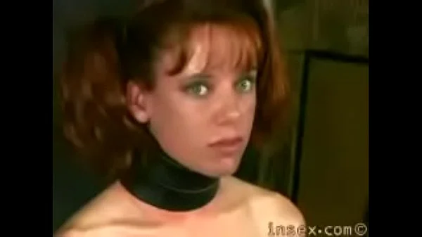 Skinny girl in metal bondage