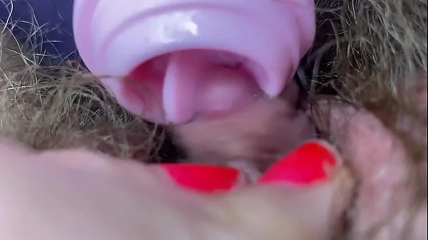 Testing Pussy licking clit licker toy big clitoris hairy pussy in extreme closeup masturbation