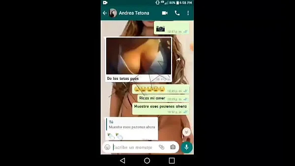 The busty girl at work gets hot talking on WhatsApp and ends up masturbating on a video call