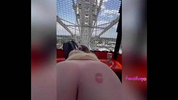 Slut get fucks in public on the Ferris wheel