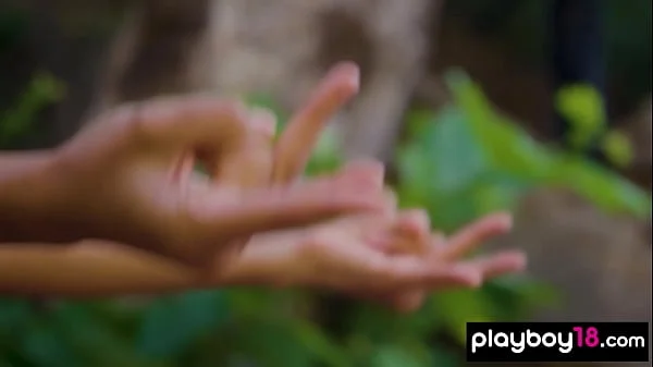 Hot MILF yoga instructors Daniella Smith naked training next to a waterfall
