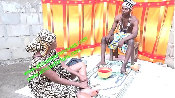 the muscular traditional african fetish marabout with a bodybuilding body and big cock fucks clients and faithful in his traditional treatment laboratory publicly in front of his other patient.  Live exclusively on xvideos.com and XVIDEOS RED